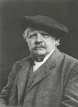 photo of an old man in a beret and tweed jacket